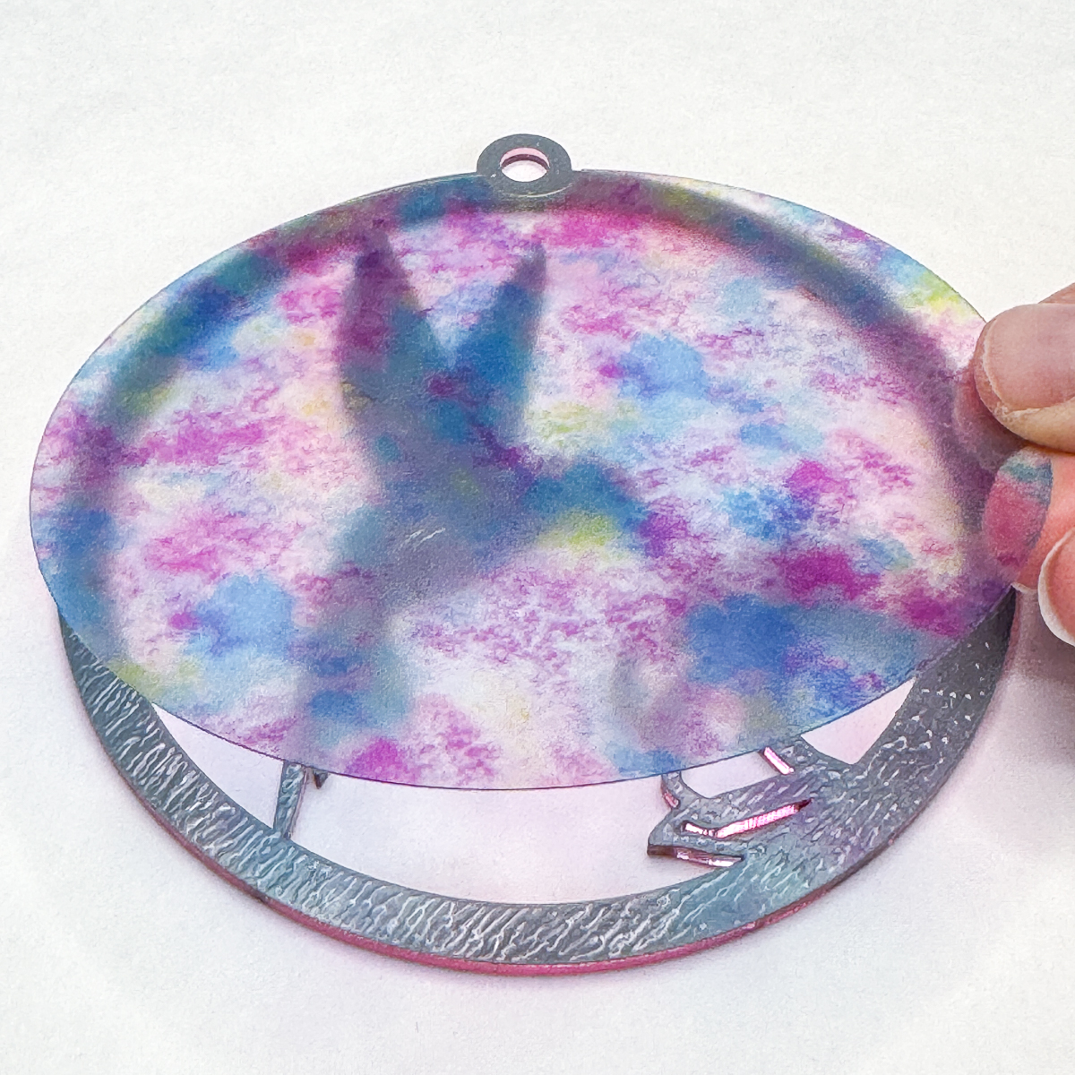 adding the translucent layer to the back of the pink suncatcher