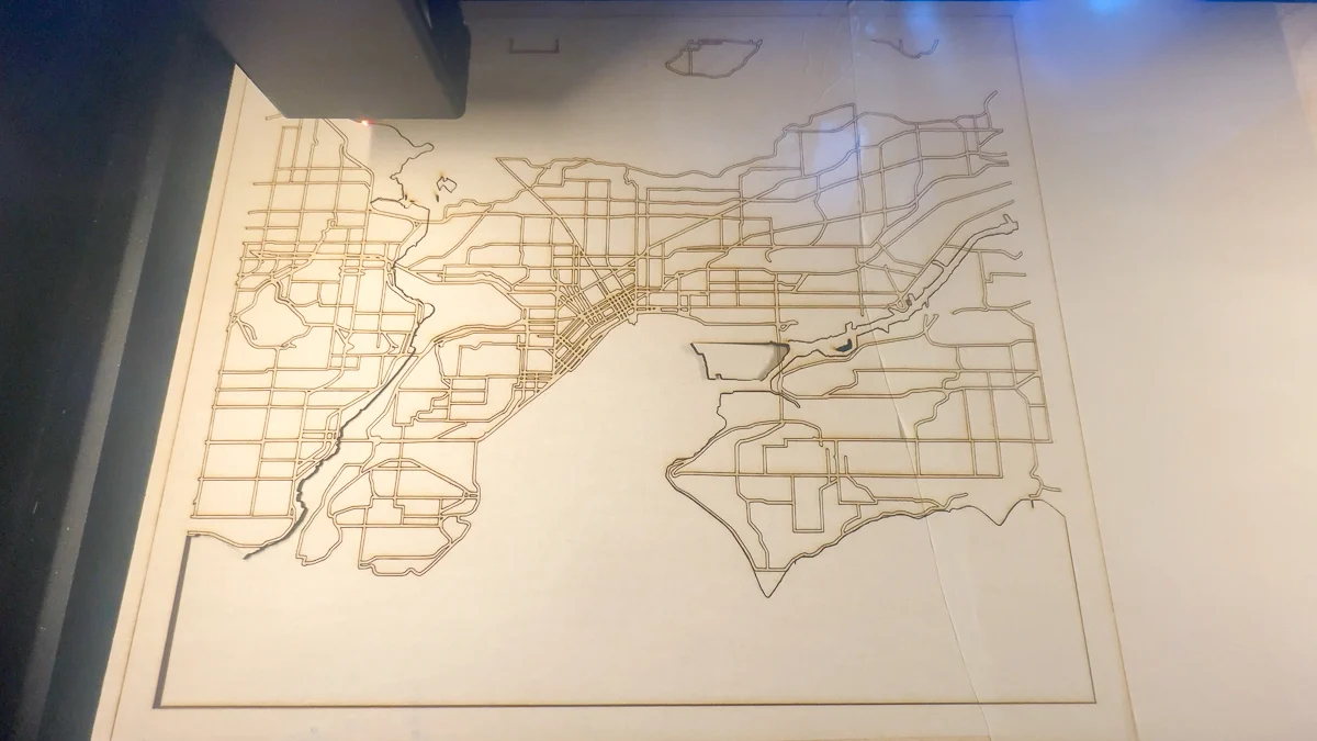 cutting the land layer of the laser cut city map with the xTool P2