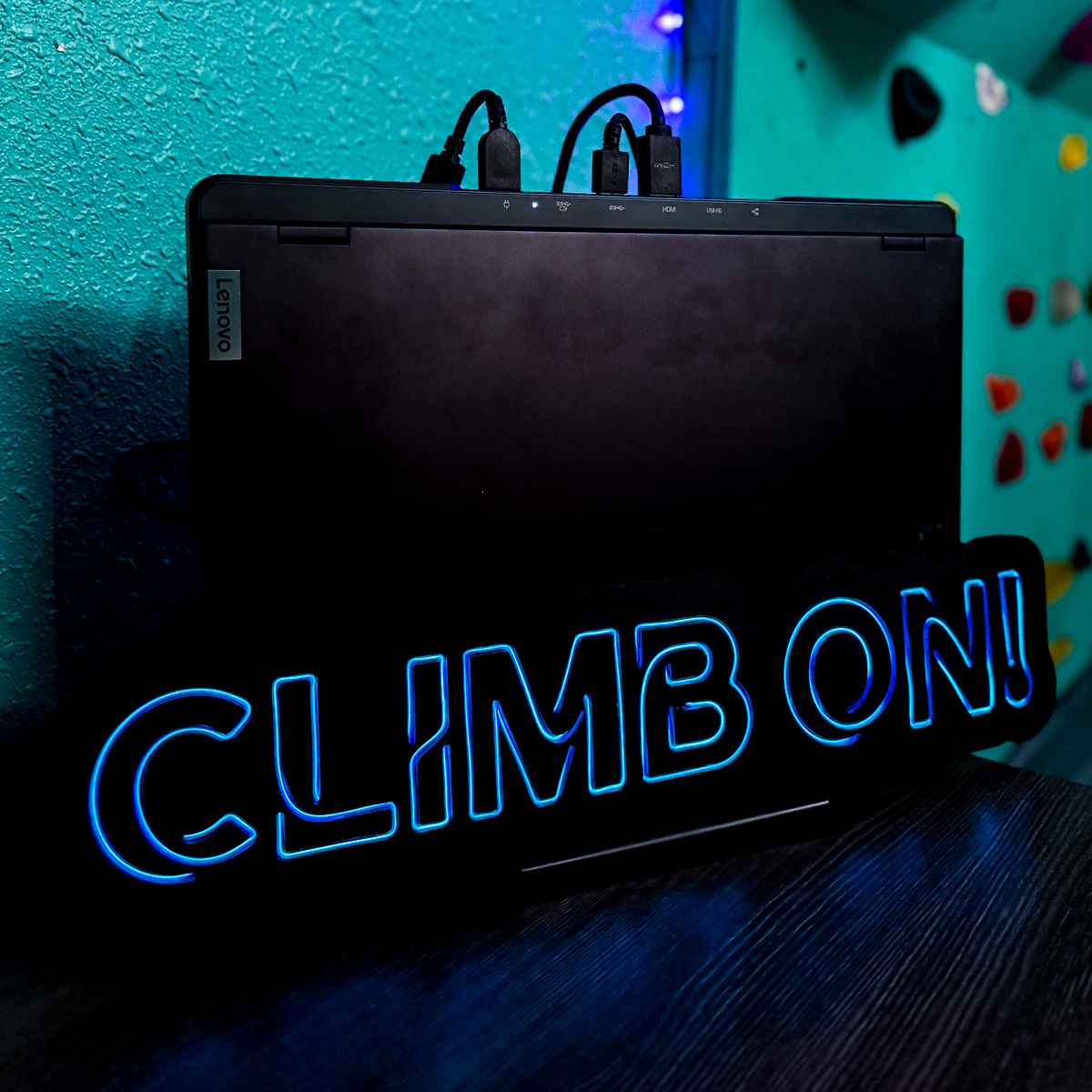 DIY LED neon sign on front of laptop holder