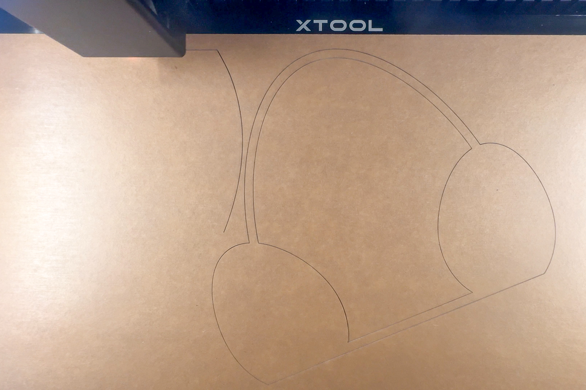 cutting the front and back of the easter candy holder on the xtool P2 laser