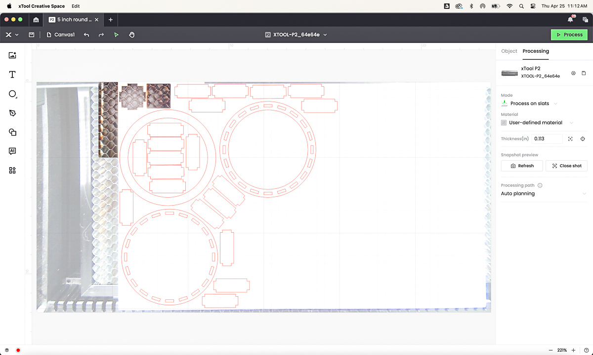 screenshot of xTool Creative Space with pieces for round wood box laid out on the board
