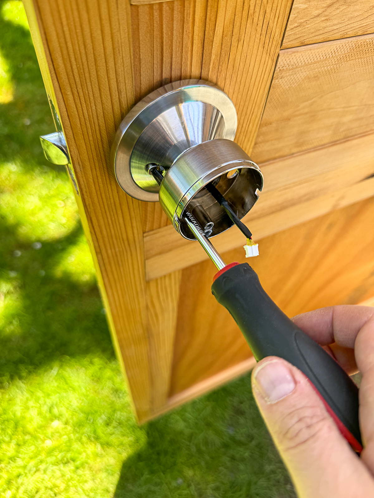 installing a new door knob with screws in back