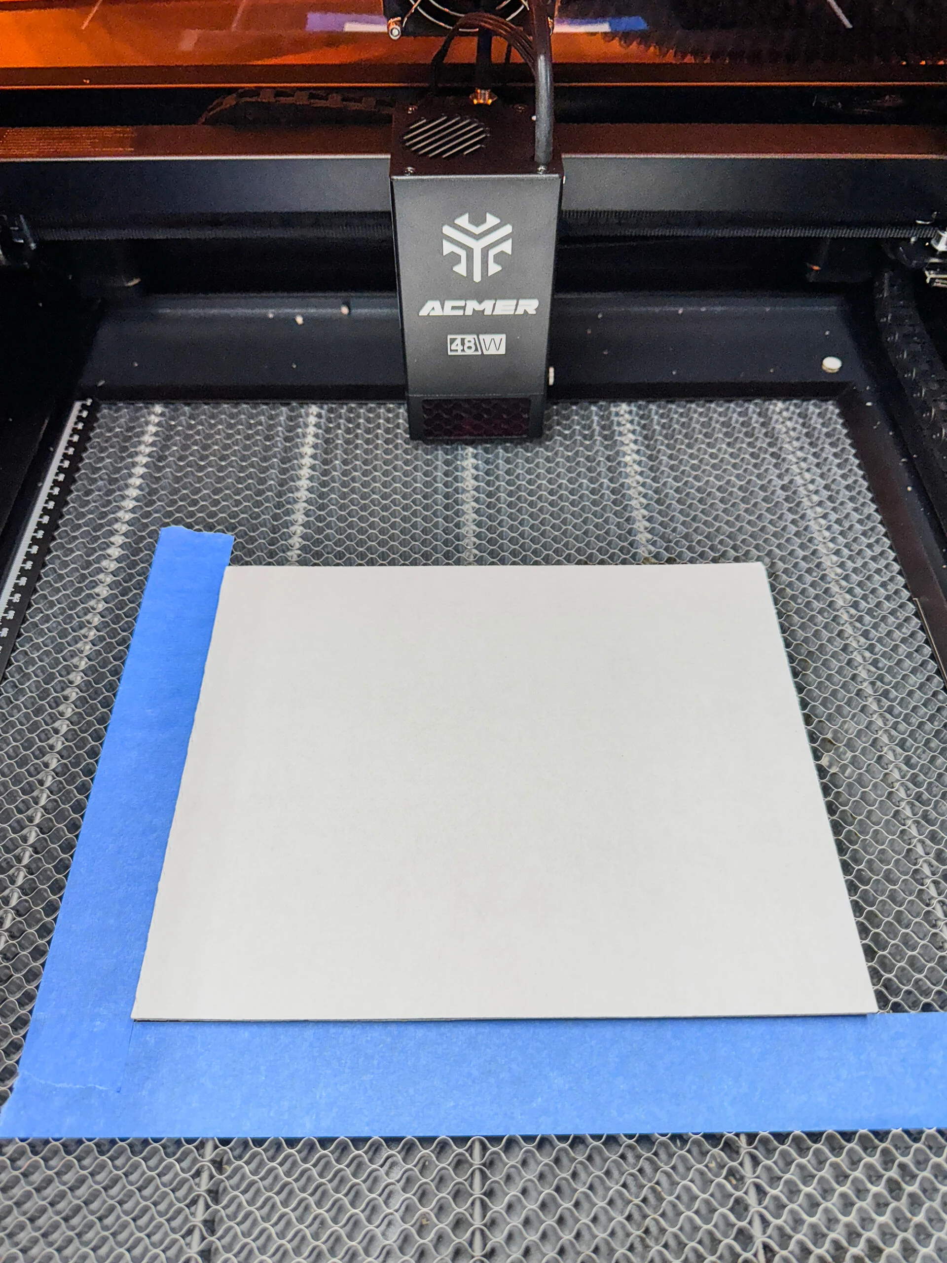 use masking tape to create a jig for perfect placement of the cardboard every time
